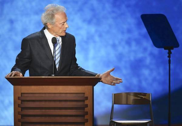 Clint Eastwood talking to chair