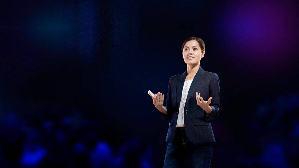 Woman using remote in a presentation